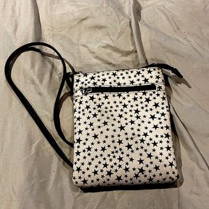 Cute kids star over shoulder bag